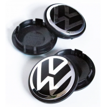 VOLKSWAGEN ΚΑΠΑΚΙΑ ΚΕΝΤΡΟΥ ΖΑΝΤΑΣ 57x66mm, ΜΑΥΡΟ/ΑΣΗΜΙ, 4 ΤΕΜΑΧΙΑ